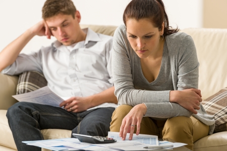 couple looking at bills